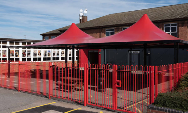 Red fabric canopy at Haven High Academy - ORION Conic