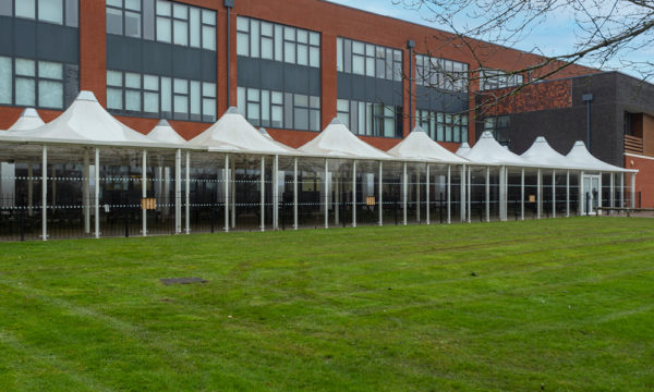 Conic fabric roof enclosed canopy at Midhurst Rother College