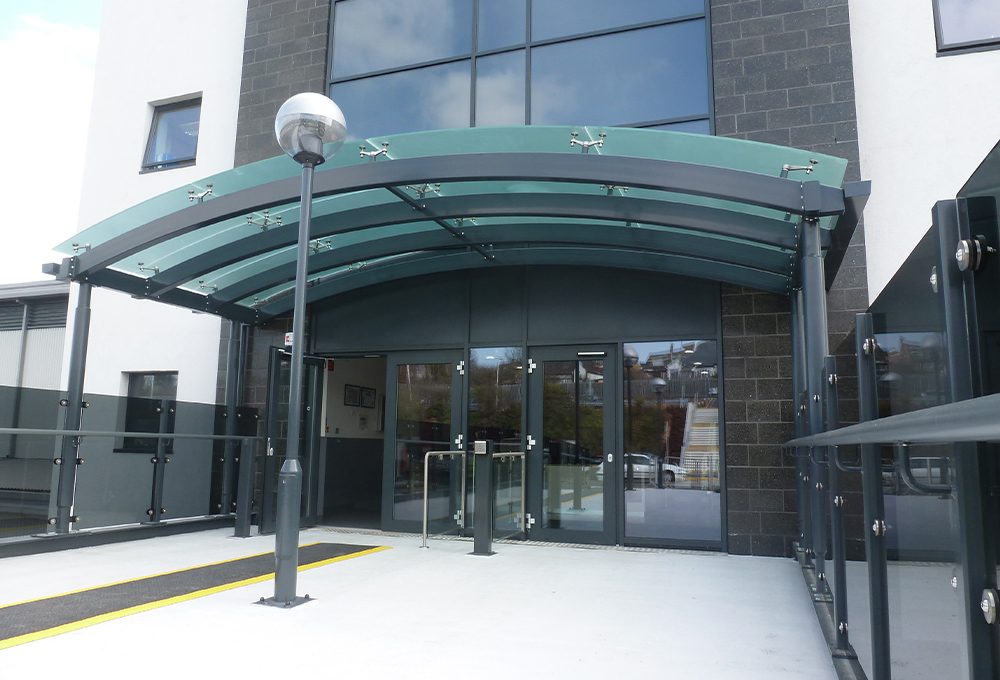 Glass entrance canopy - TRITON