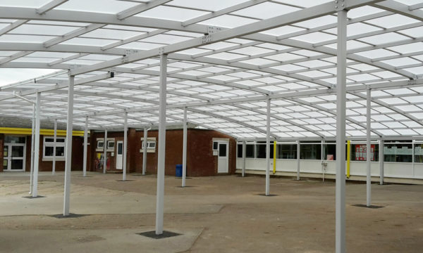 Covered Spaces for Schools